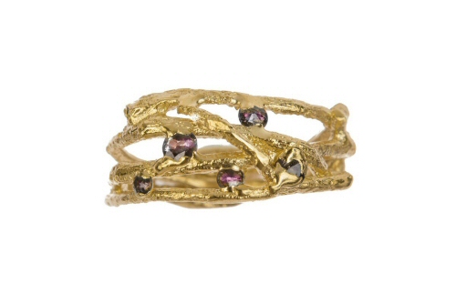 Entwined twig and ruby ring.
